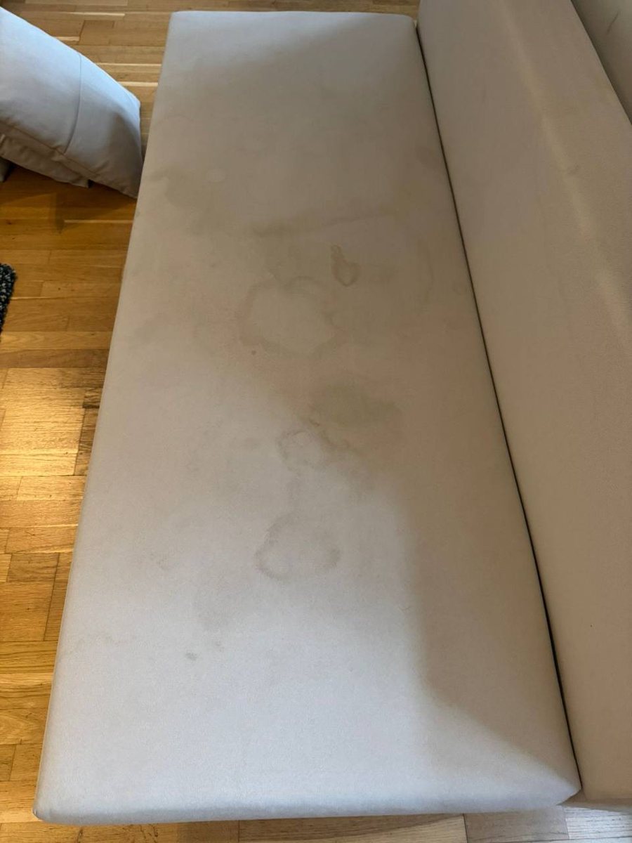 Leather seating — stains lifted, colour even again — Before